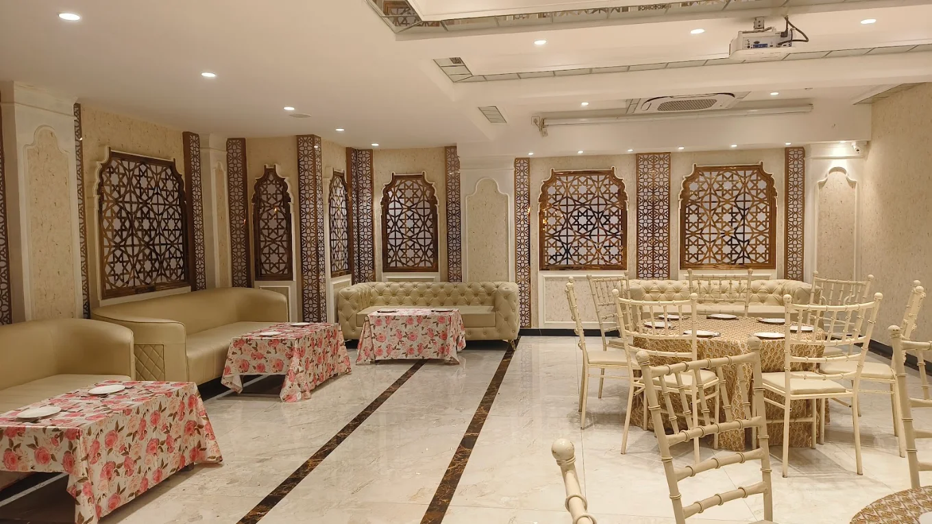 Royal Mughal style banquet hall with jharokha decor