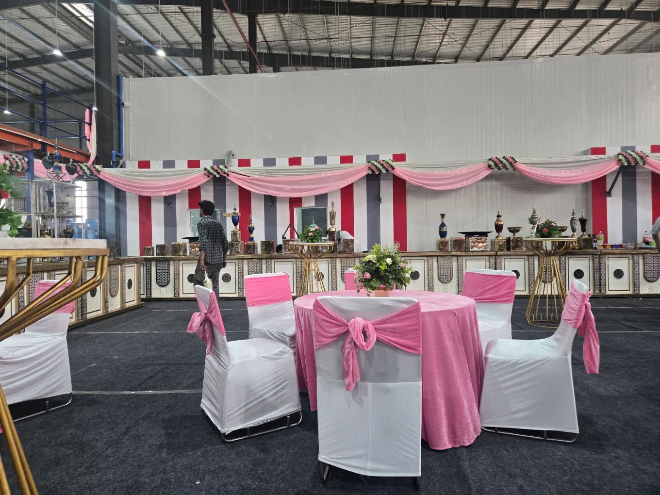 Pink and white banquet decoration with draped ceiling